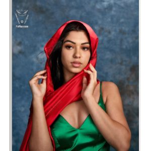 Sophia. Model wearing green dress and red scarf. Image processed with artistic paint effect.